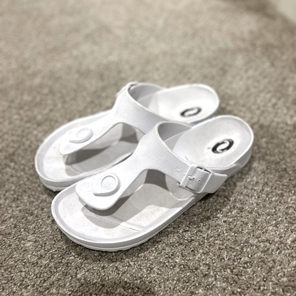 White rubber flip flops